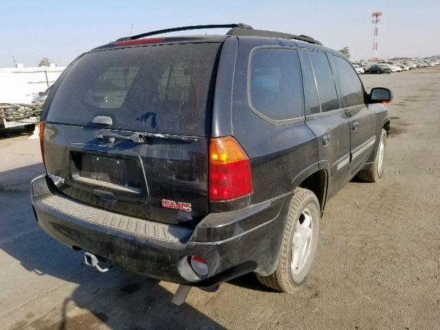 1GKDS13SX22354604 - 2002 GMC ENVOY BLACK photo 4