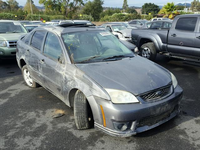 1FAHP34N06W168500 - 2006 FORD FOCUS ZX4 GRAY photo 1