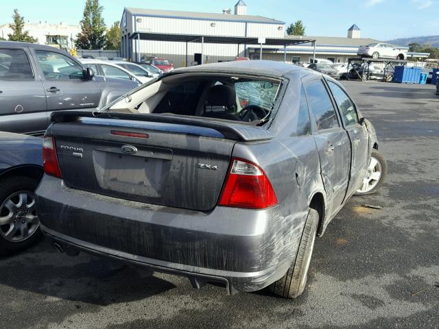 1FAHP34N06W168500 - 2006 FORD FOCUS ZX4 GRAY photo 4