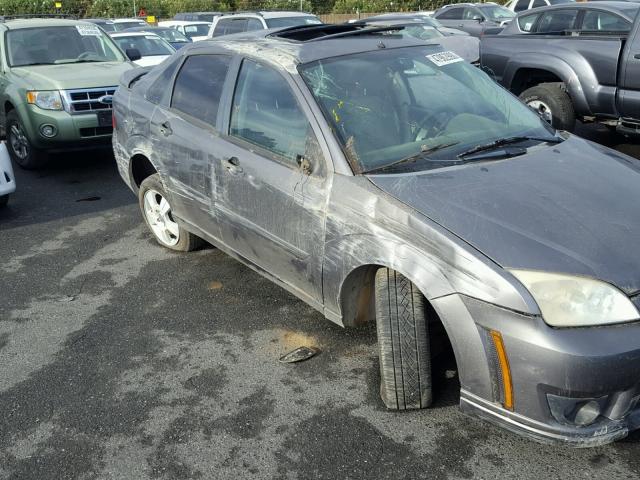 1FAHP34N06W168500 - 2006 FORD FOCUS ZX4 GRAY photo 9