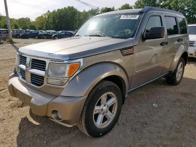 1D8GU28K67W729746 - 2007 DODGE NITRO SXT GOLD photo 2