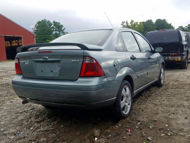 1FAFP34N65W294740 - 2005 FORD FOCUS ZX4 TEAL photo 4