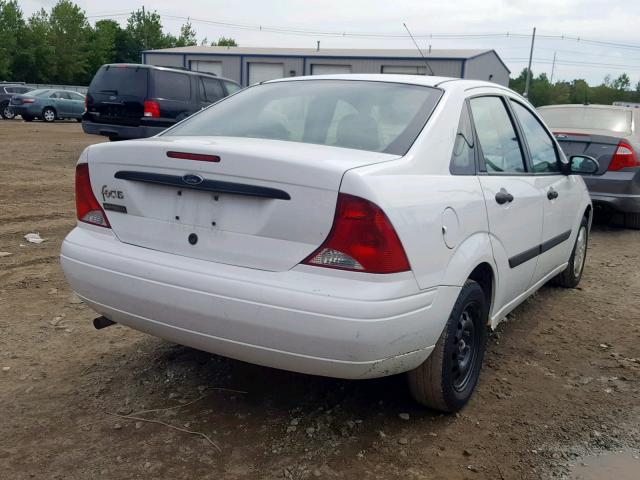 1FAFP33P93W131886 - 2003 FORD FOCUS LX WHITE photo 4