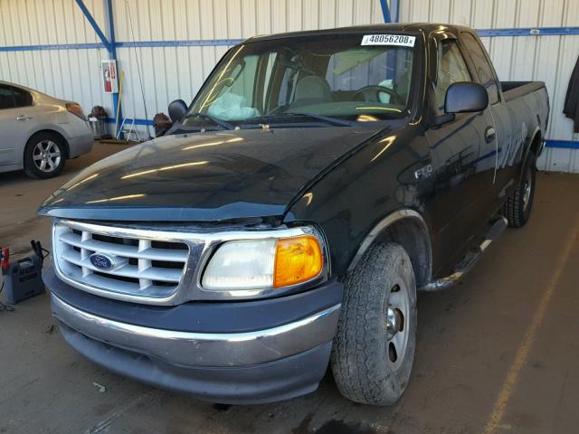 2FTRX17274CA69203 - 2004 FORD F-150 HERI GREEN photo 2