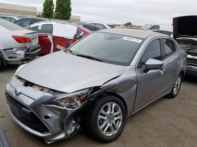 3MYDLBZV3GY127104 - 2016 TOYOTA SCION IA GRAY photo 2