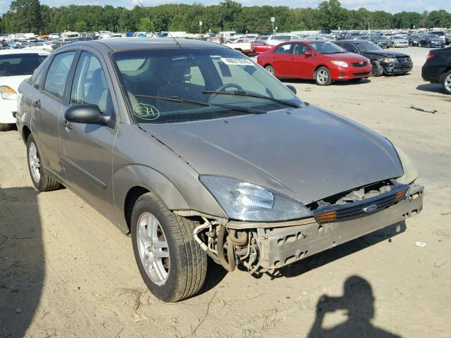 1FAFP34Z94W114135 - 2004 FORD FOCUS SE C GOLD photo 1