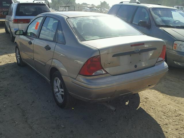 1FAFP34Z94W114135 - 2004 FORD FOCUS SE C GOLD photo 3