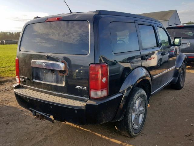 1D8GU58K48W145879 - 2008 DODGE NITRO SLT BLACK photo 4