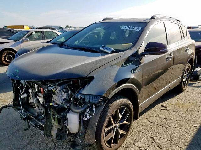 JTMJJREV6JD198801 - 2018 TOYOTA RAV4 HV SE BLACK photo 2