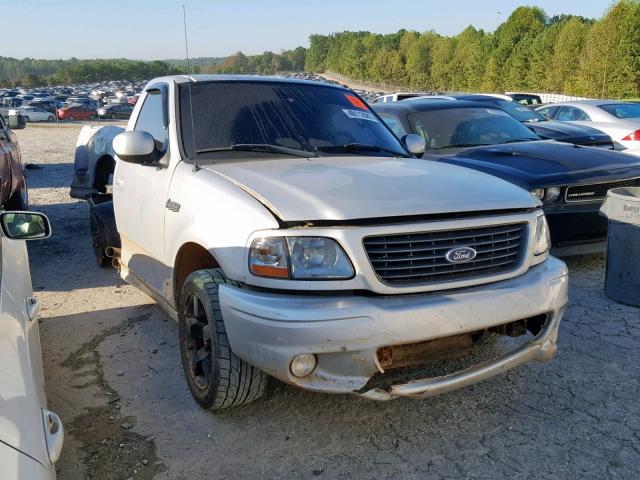 2FTRF07374CA64251 - 2004 FORD F150 SVT L SILVER photo 1