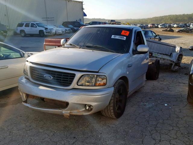 2FTRF07374CA64251 - 2004 FORD F150 SVT L SILVER photo 2