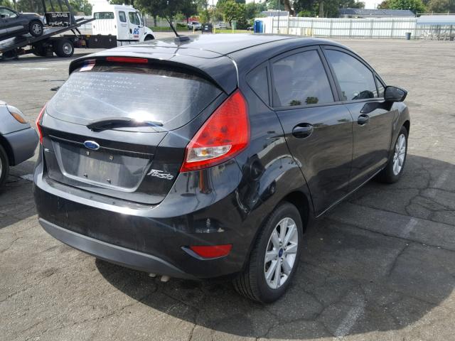 3FADP4EJ2CM156067 - 2012 FORD FIESTA SE BLACK photo 4