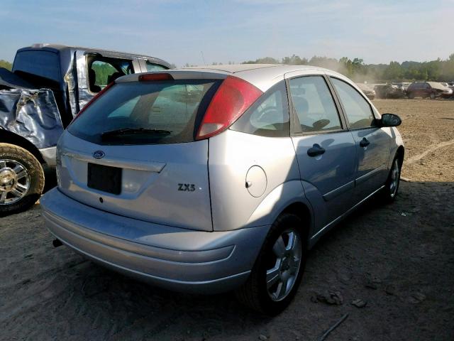 3FAFP37333R107089 - 2003 FORD FOCUS ZX5 GRAY photo 4