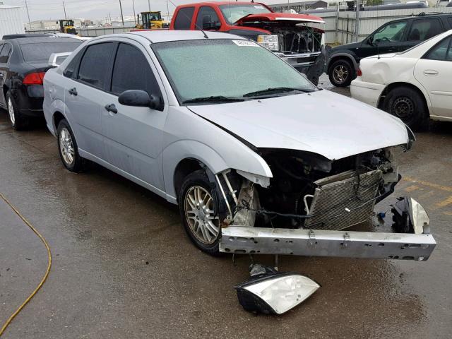 1FAHP34N27W142367 - 2007 FORD FOCUS ZX4 SILVER photo 1