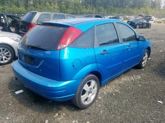 1FAHP37N37W182596 - 2007 FORD FOCUS ZX5 BLUE photo 4