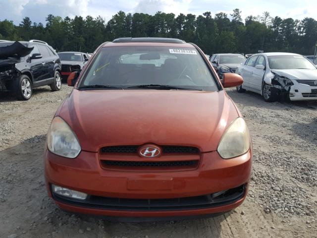 KMHCN36C47U007808 - 2007 HYUNDAI ACCENT SE ORANGE photo 9