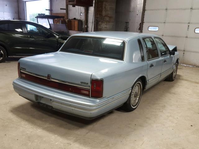 1LNLM81W6NY749893 - 1992 LINCOLN TOWN CAR E BLUE photo 4