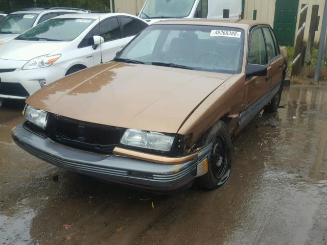 1G2NE54U6KC678128 - 1989 PONTIAC GRAND AM L TAN photo 2