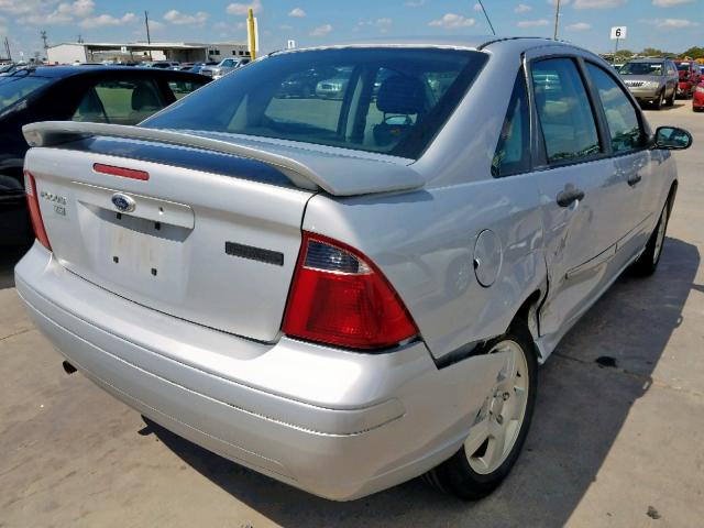 1FAHP34N87W187846 - 2007 FORD FOCUS ZX4 SILVER photo 4