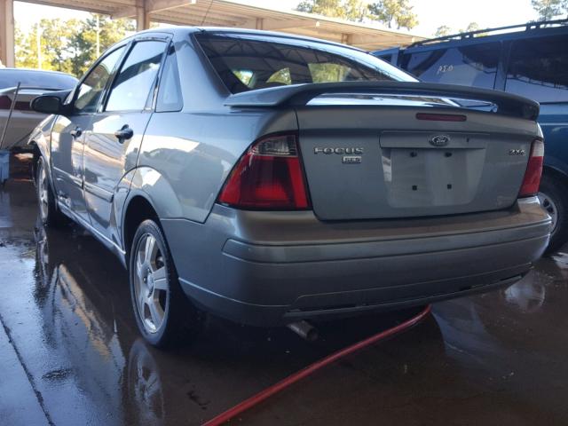 1FAHP34N45W166506 - 2005 FORD FOCUS ZX4 GRAY photo 3