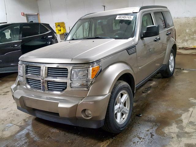 1D8GU58K87W609108 - 2007 DODGE NITRO SLT GOLD photo 2