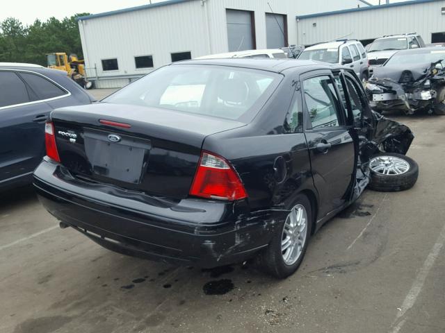 1FAHP34N37W117901 - 2007 FORD FOCUS ZX4 BLACK photo 4