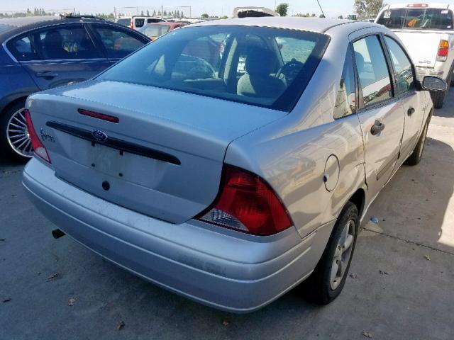 1FAFP33Z03W244224 - 2003 FORD FOCUS LX SILVER photo 4