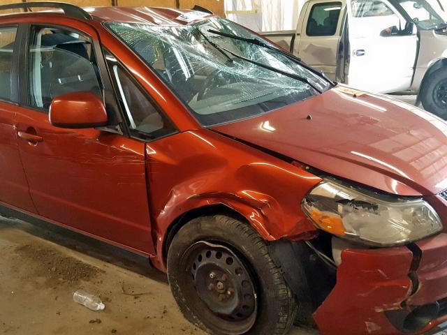 JS2YB5A36B6304829 - 2011 SUZUKI SX4 ORANGE photo 9