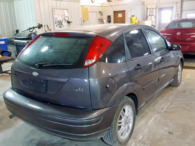 3FAFP37363R169411 - 2003 FORD FOCUS ZX5 GRAY photo 4