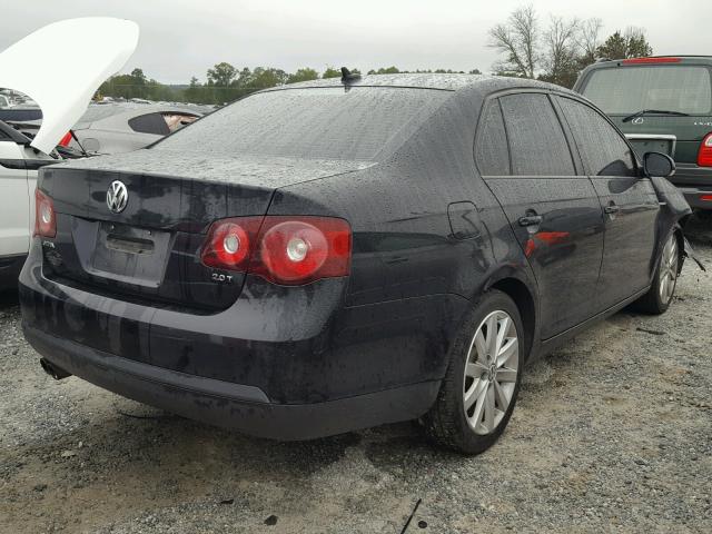 3VWRA7AJ3AM106104 - 2010 VOLKSWAGEN JETTA WOLF BLACK photo 4