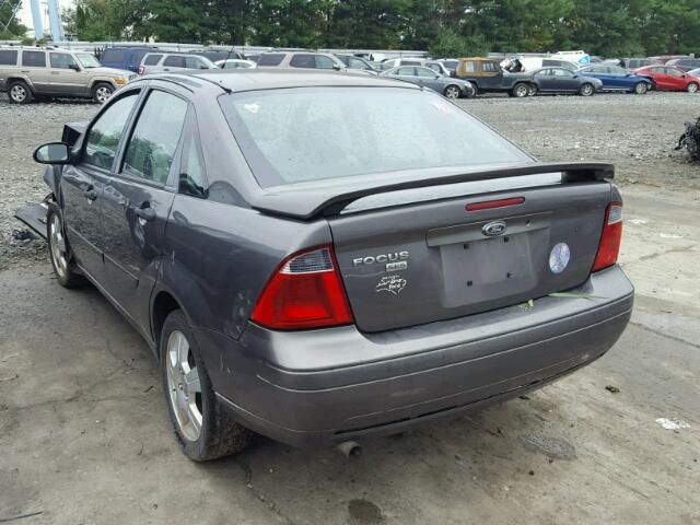 1FAFP34N77W230547 - 2007 FORD FOCUS ZX4 GRAY photo 3