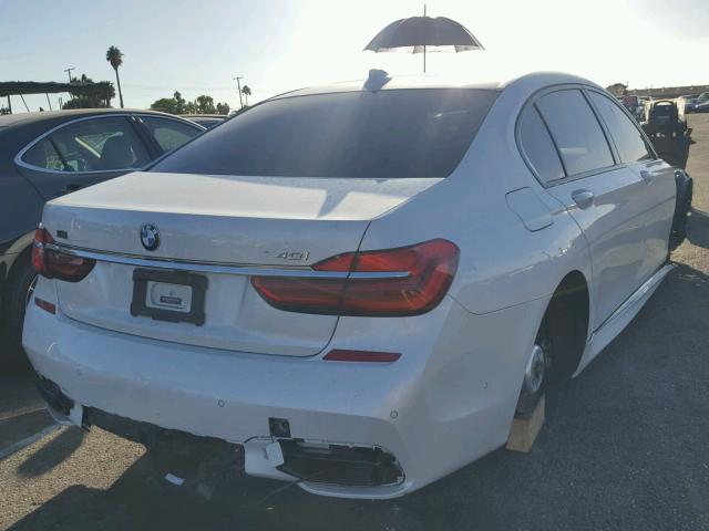 WBA7E2C54GG548195 - 2016 BMW 740 I WHITE photo 4