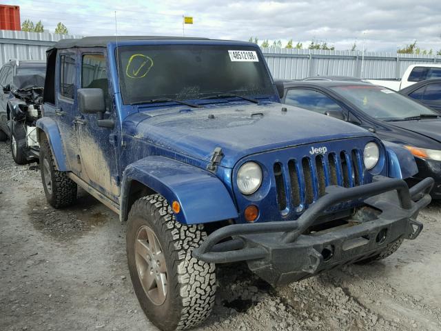 1J4GA59139L712299 - 2009 JEEP WRANGLER U BLUE photo 1