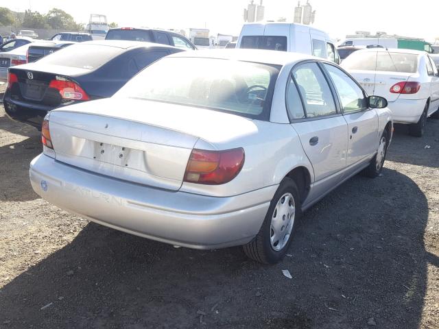 1G8ZH52842Z310919 - 2002 SATURN SL1 SILVER photo 4