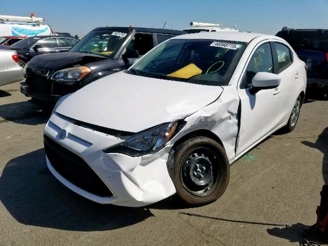 3MYDLBYV6KY524171 - 2019 TOYOTA YARIS L WHITE photo 2