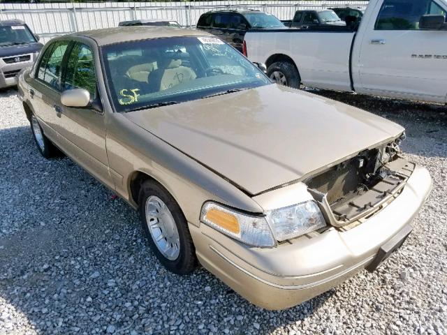 2FAFP74W0YX154272 - 2000 FORD CROWN VICT GOLD photo 1