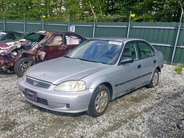 2HGEJ6620XH507065 - 1999 HONDA CIVIC DX SILVER photo 2