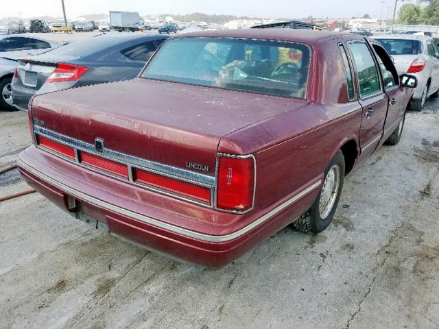 1LNLM82W9VY734142 - 1997 LINCOLN TOWN CAR S RED photo 4