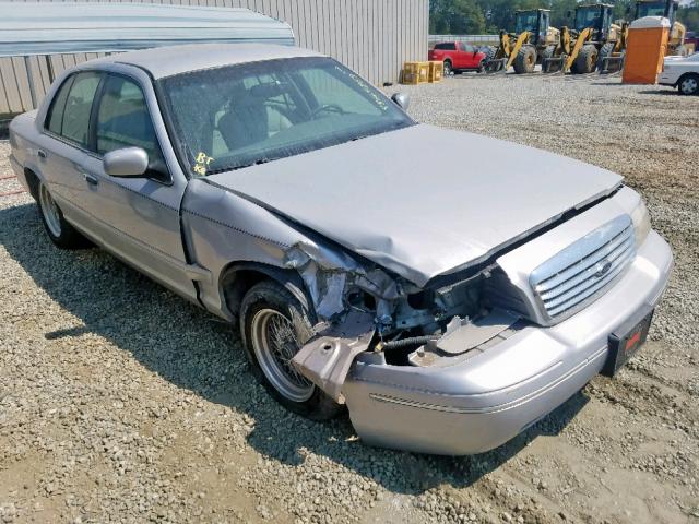 2FAFP74W52X100327 - 2002 FORD CROWN VICT SILVER photo 1