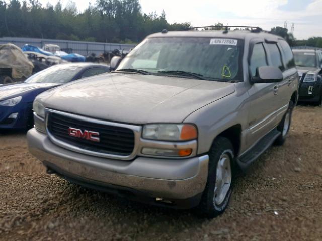 1GKEK13Z14R157204 - 2004 GMC YUKON SILVER photo 2