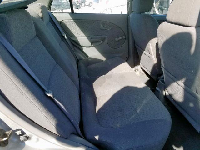 KNADC125346300929 - 2004 KIA RIO SILVER photo 6