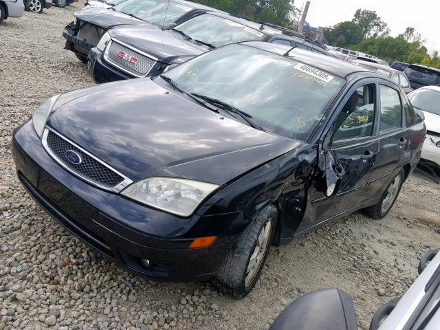 1FAHP34N57W342126 - 2007 FORD FOCUS ZX4 BLACK photo 9