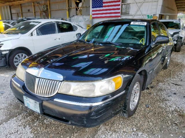 1LNFM82W0XY605822 - 1999 LINCOLN TOWN CAR S BLACK photo 2