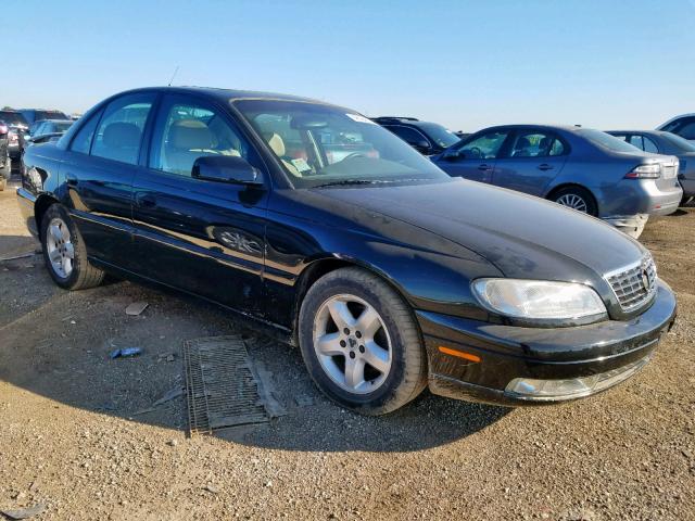 W06VR54R3YR060686 - 2000 CADILLAC CATERA BLACK photo 1