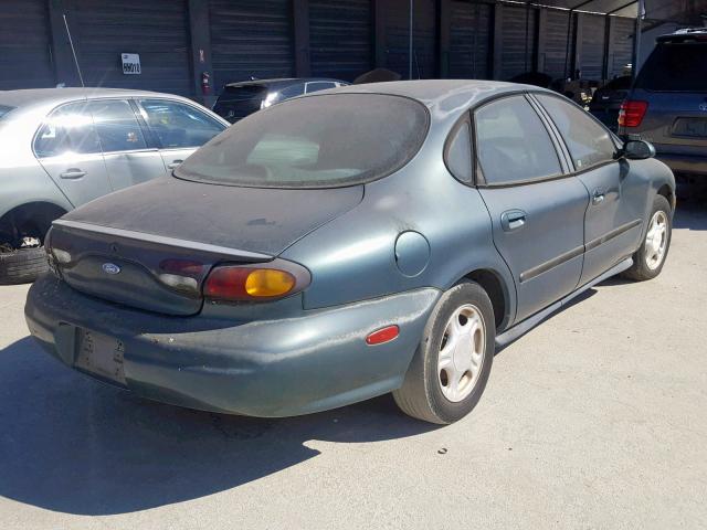 1FALP52U3VG120918 - 1997 FORD TAURUS GL BLUE photo 4