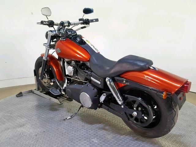 1HD1GY411BC318629 - 2011 HARLEY-DAVIDSON FXDF ORANGE photo 6