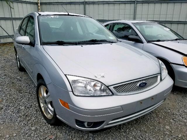 1FAHP38Z25W294353 - 2005 FORD FOCUS ZX4 SILVER photo 1