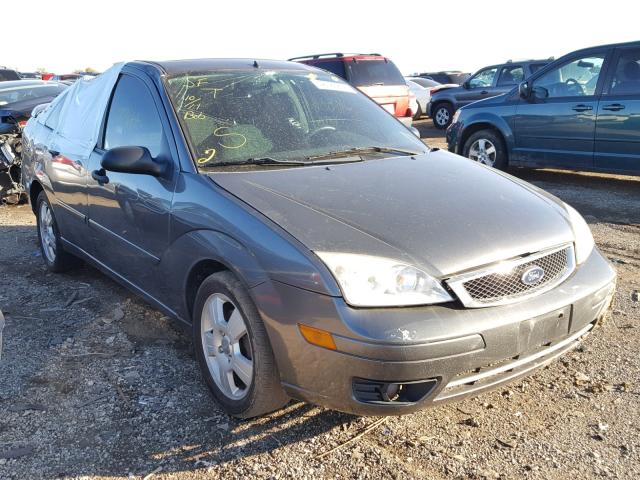 1FAHP34N77W362300 - 2007 FORD FOCUS ZX4 GRAY photo 1