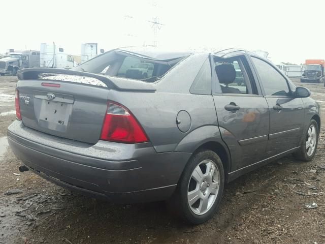 1FAHP34N77W362300 - 2007 FORD FOCUS ZX4 GRAY photo 4