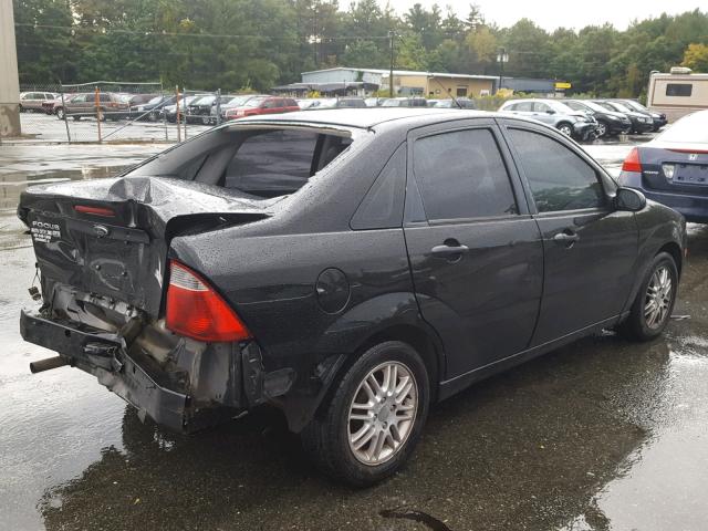 1FAHP34N47W352582 - 2007 FORD FOCUS ZX4 BLACK photo 4